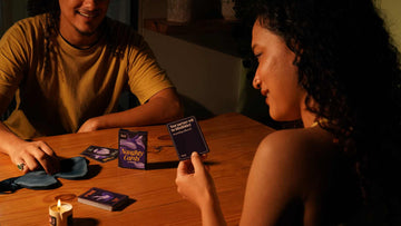 A couple playing MyMuse’s Naughty Cards